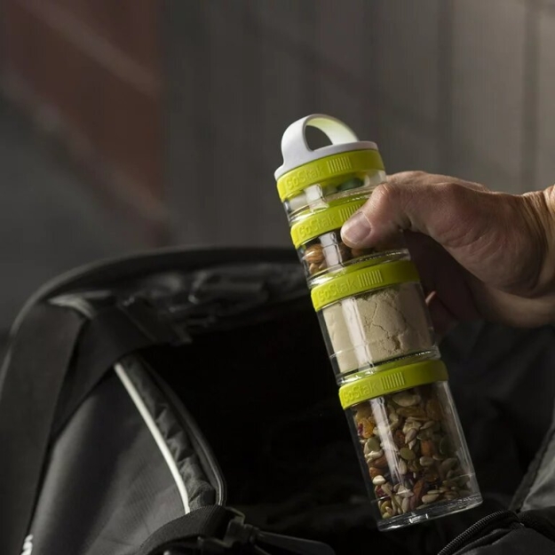Blender Bottle GoStak Starter 4Pak - slyvų paveikslėlį Blender Bottle GoStak Starter 4Pak - slyvų nuotrauka